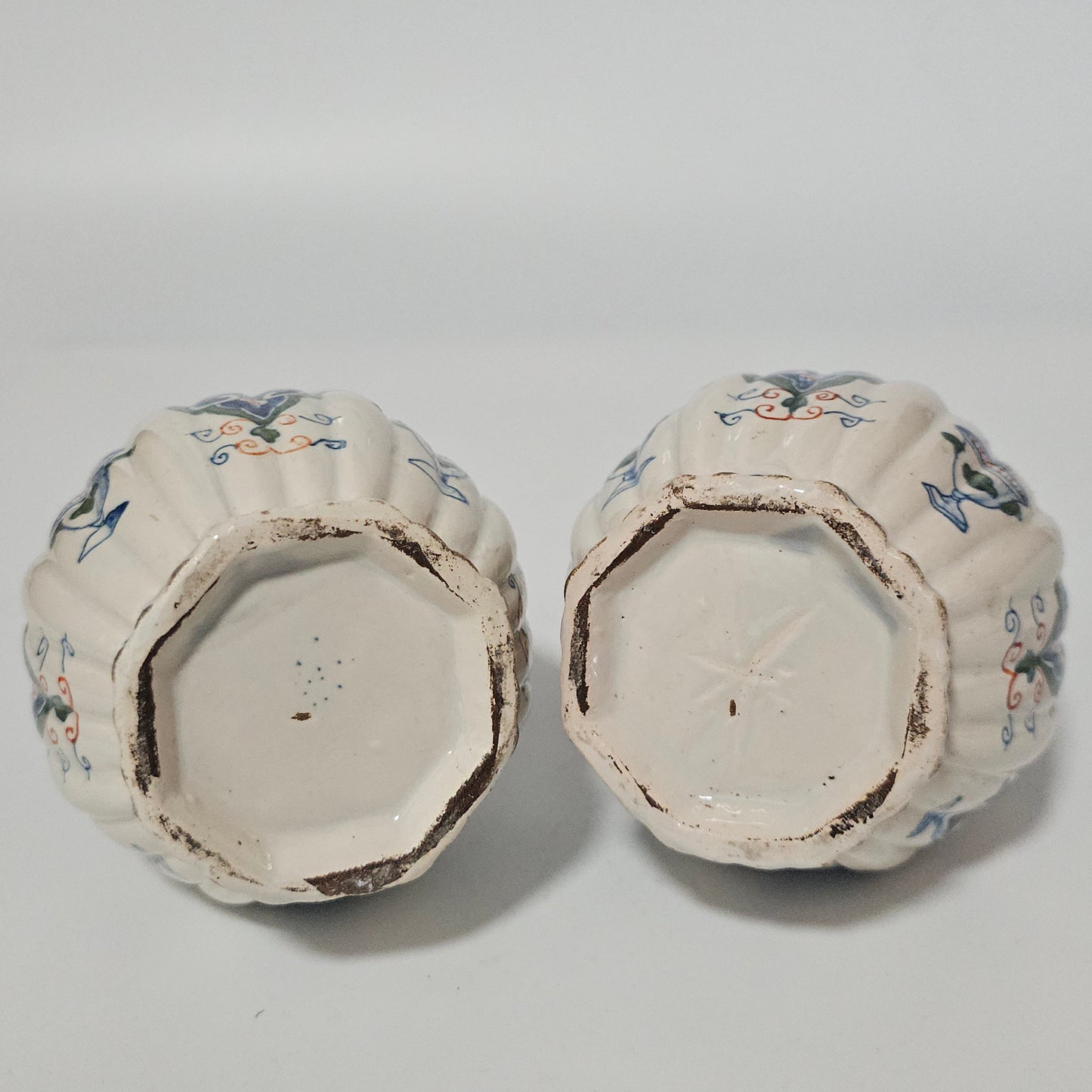 A Matched Pair of Dutch Delft Ribbed Bottle Vases c 1700/1720