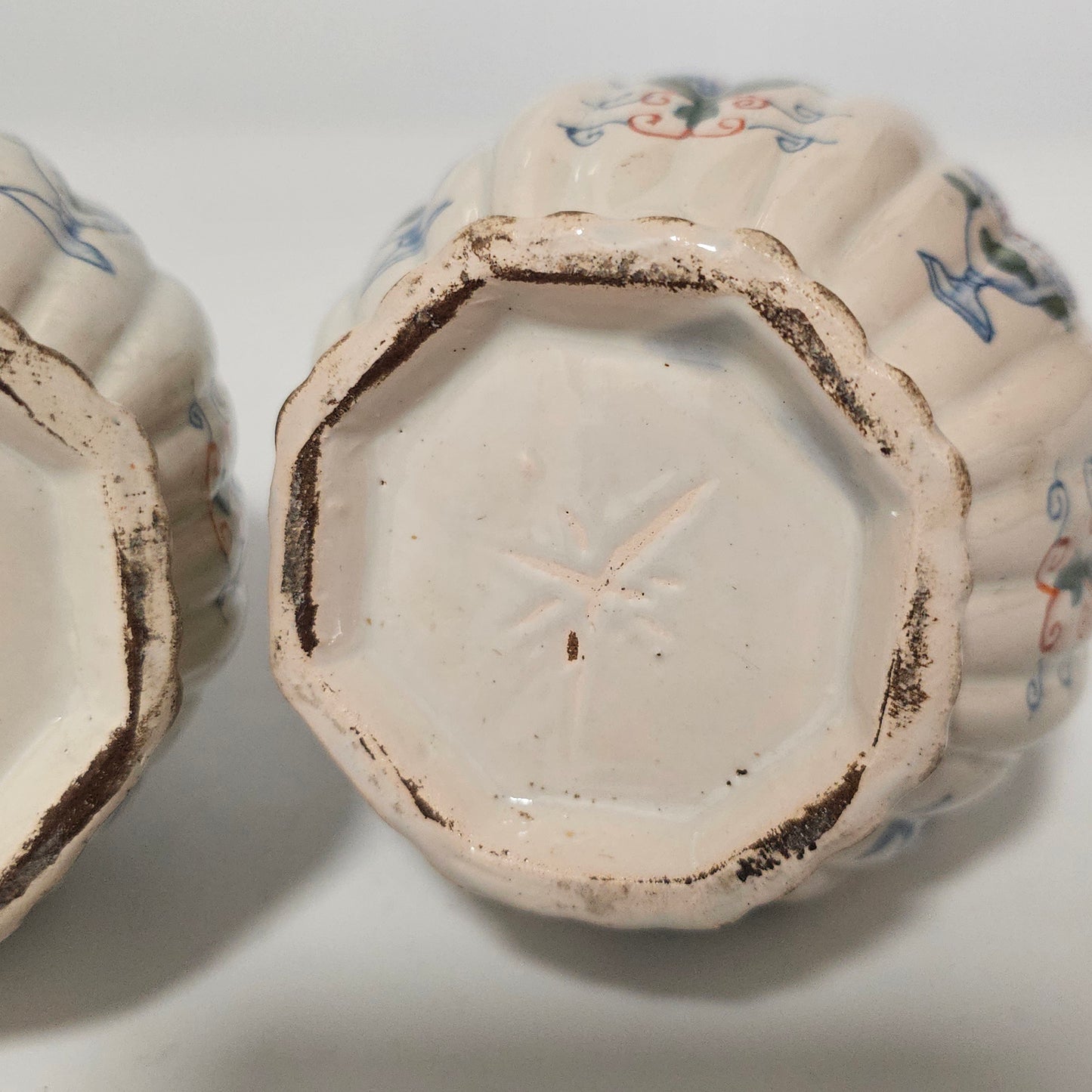 A Matched Pair of Dutch Delft Ribbed Bottle Vases c 1700/1720