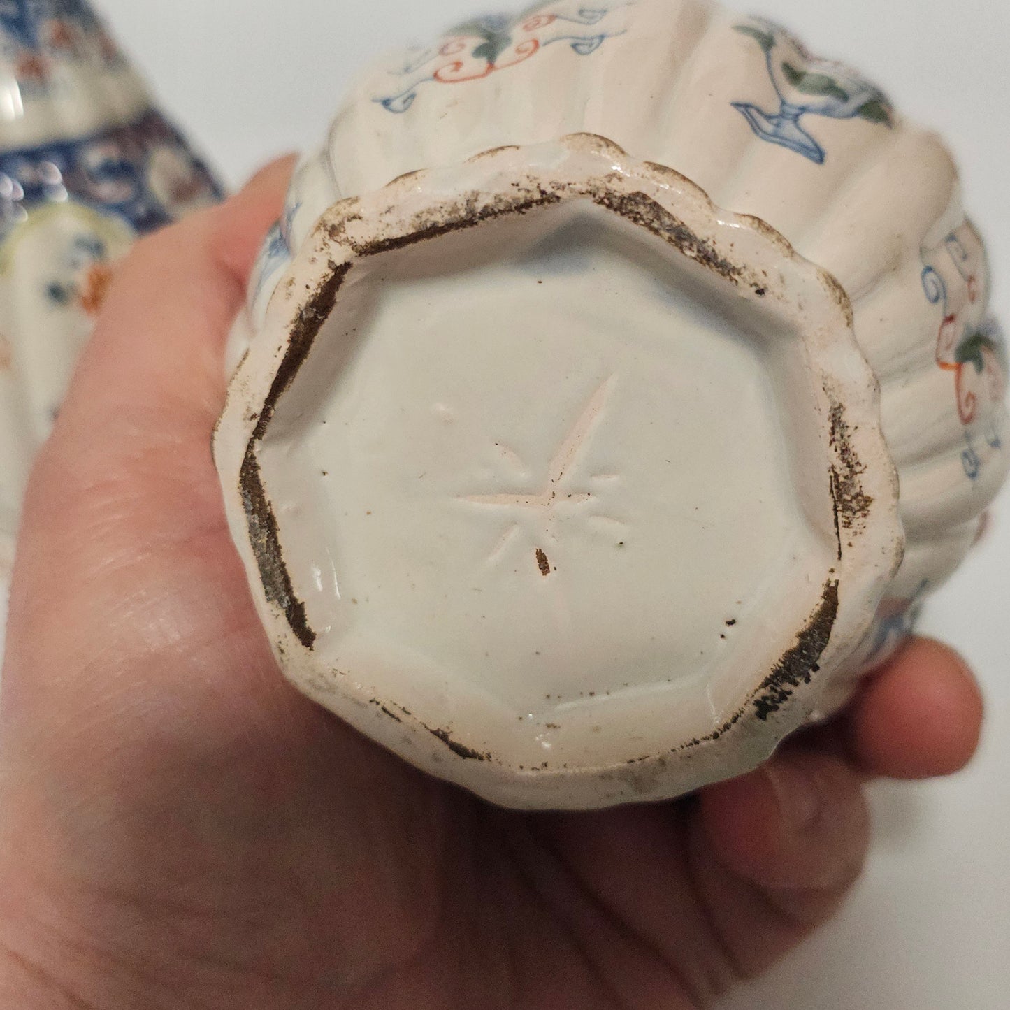 A Matched Pair of Dutch Delft Ribbed Bottle Vases c 1700/1720