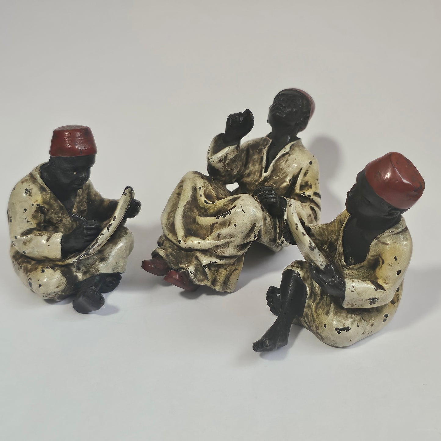 Cold-Painted Bronze Figurines – Arabian Scholars & Teacher Trio (Stamped “B” for Franz Bergman)