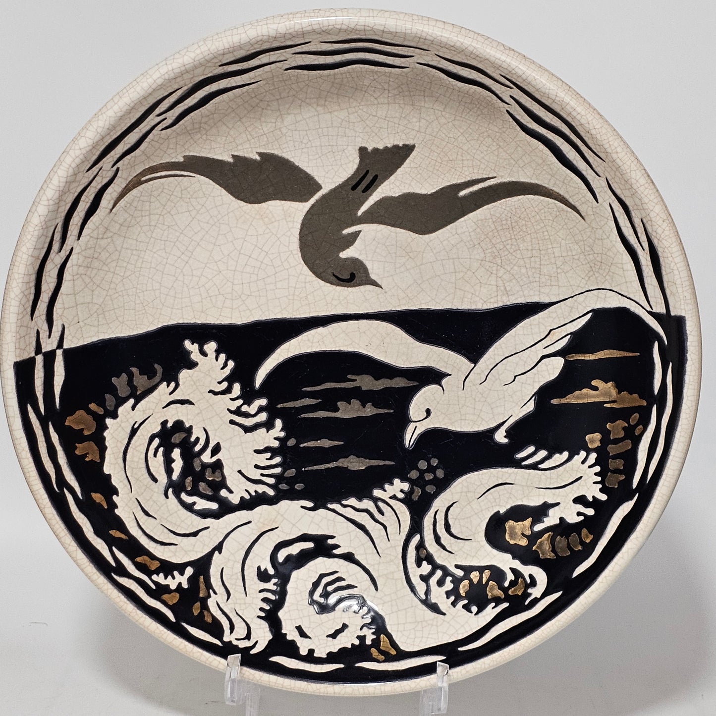 A Large Longwy Primavera art deco charger decorated with seagulls