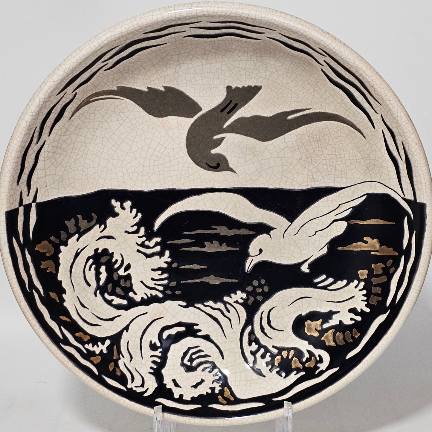 A Large Longwy Primavera art deco charger decorated with seagulls