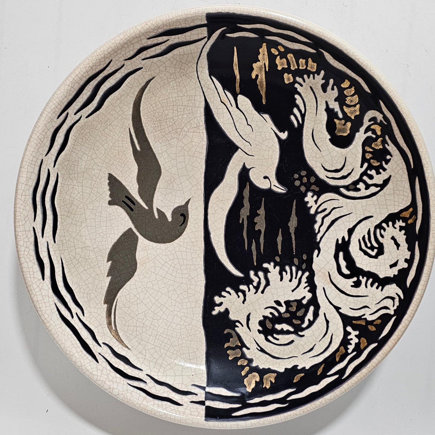 A Large Longwy Primavera art deco charger decorated with seagulls