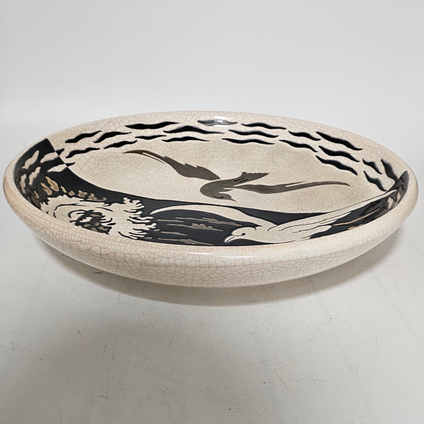 A Large Longwy Primavera art deco charger decorated with seagulls