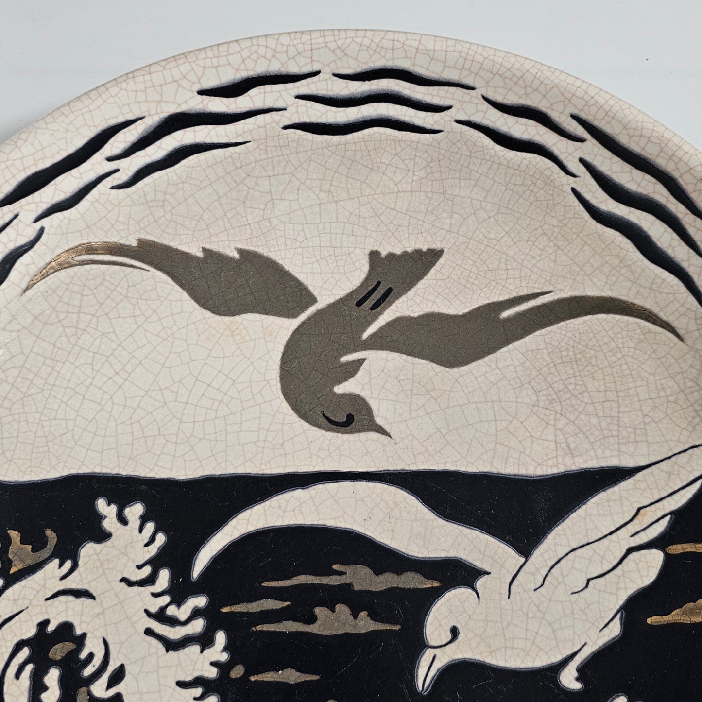 A Large Longwy Primavera art deco charger decorated with seagulls