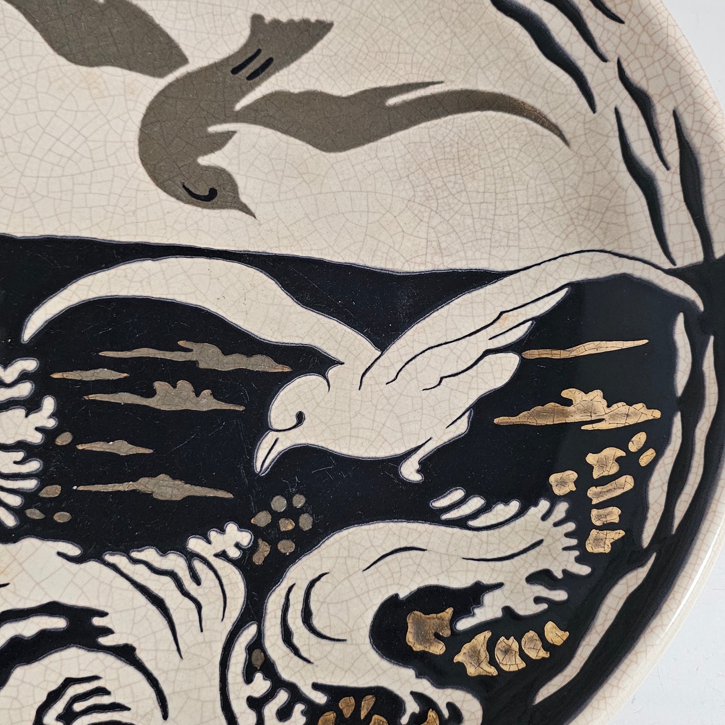 A Large Longwy Primavera art deco charger decorated with seagulls