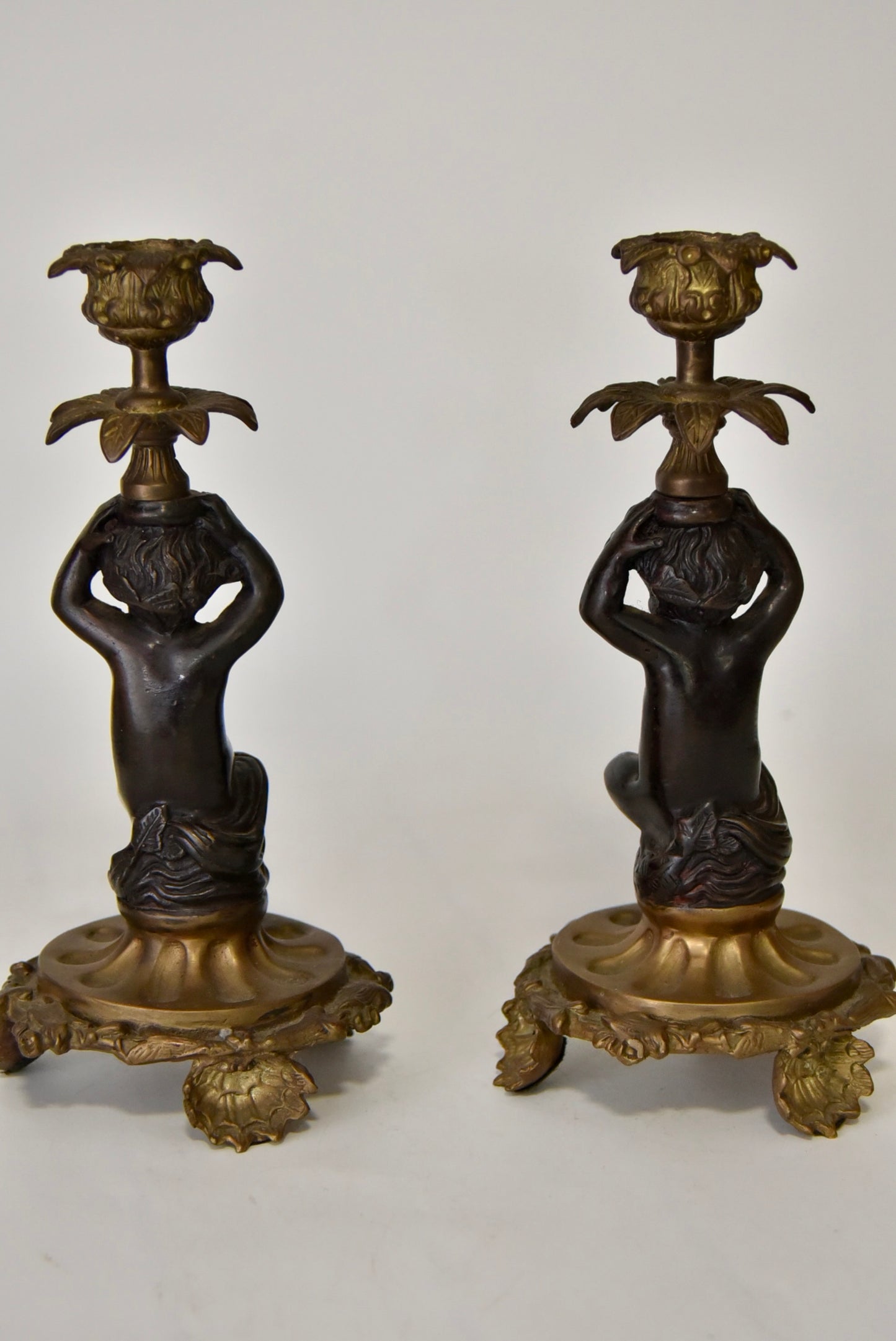 Attractive Pair of Bronze and Brass Cherub Candlesticks, circa 1900