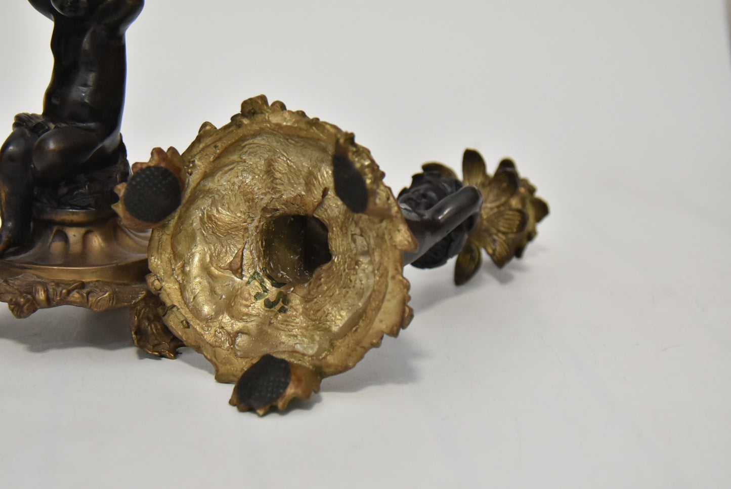 Attractive Pair of Bronze and Brass Cherub Candlesticks, circa 1900