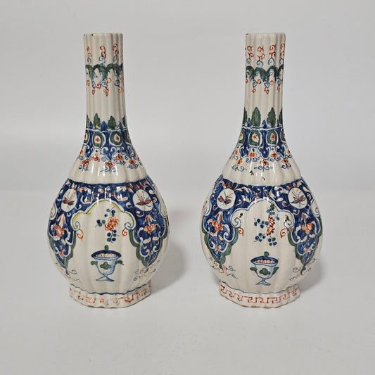 A Matched Pair of Dutch Delft Ribbed Bottle Vases c 1700/1720