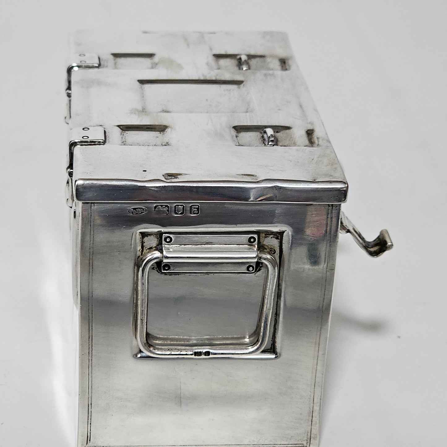 Very Fine and Unusual Silver Casket Modelled as a Coffer for Cigarettes c1941