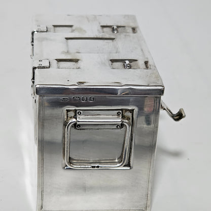 Very Fine and Unusual Silver Casket Modelled as a Coffer for Cigarettes c1941