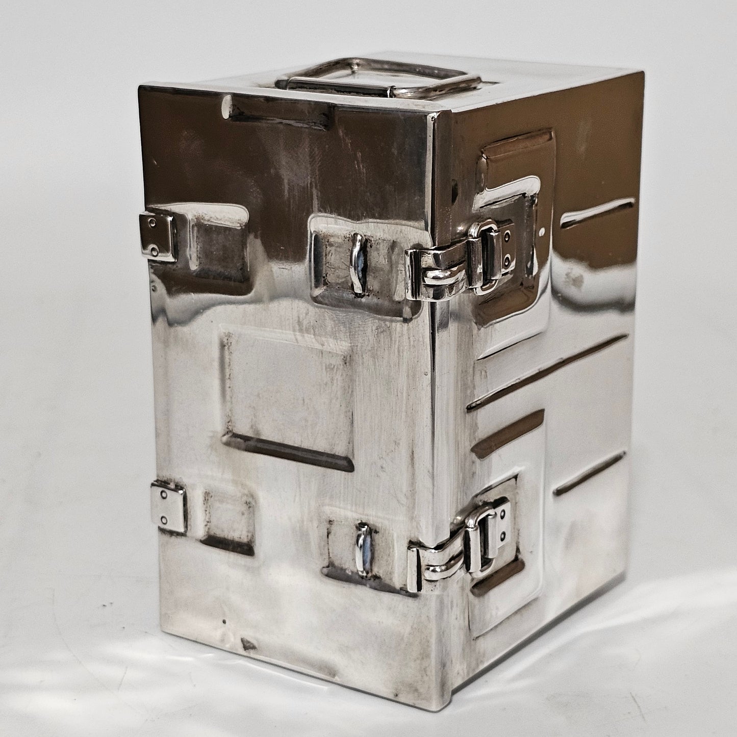 Very Fine and Unusual Silver Casket Modelled as a Coffer for Cigarettes c1941