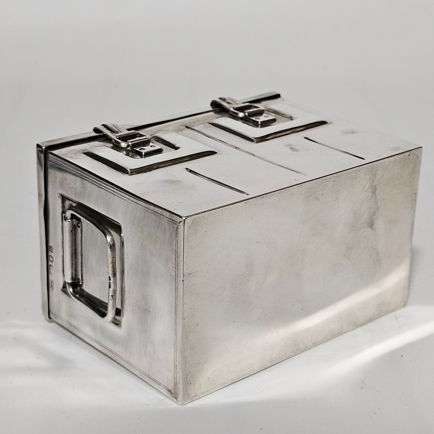 Very Fine and Unusual Silver Casket Modelled as a Coffer for Cigarettes c1941