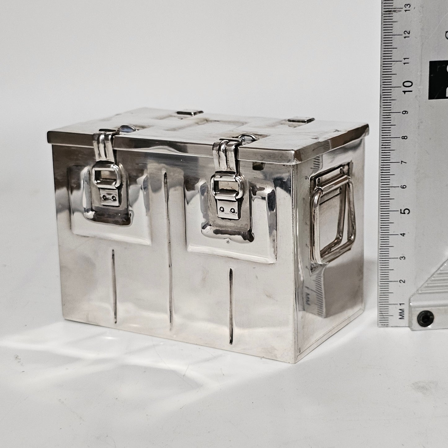 Very Fine and Unusual Silver Casket Modelled as a Coffer for Cigarettes c1941