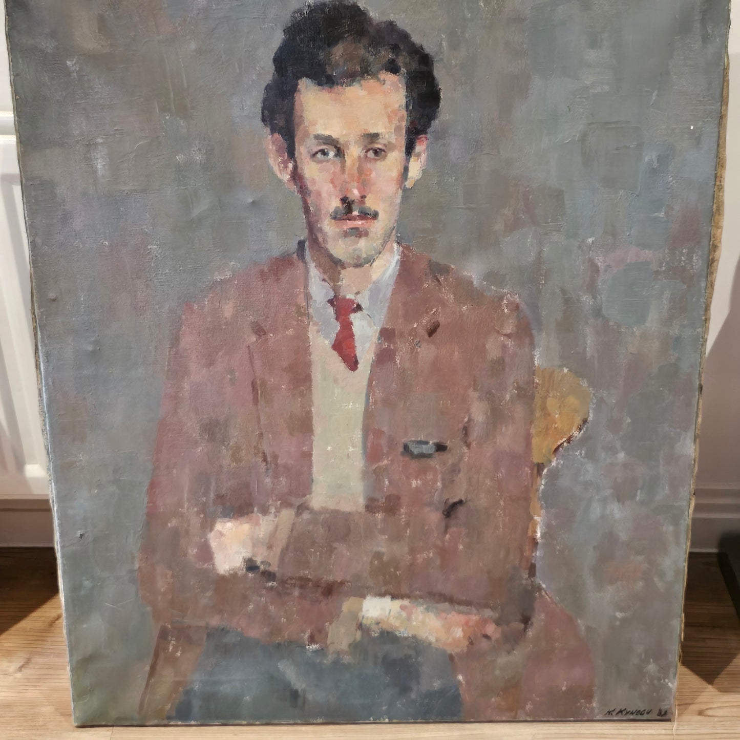 Kathryn Kynoch R.G.I (Scottish b1942 - 2025) - 102cm. portrait of a man with arms folded