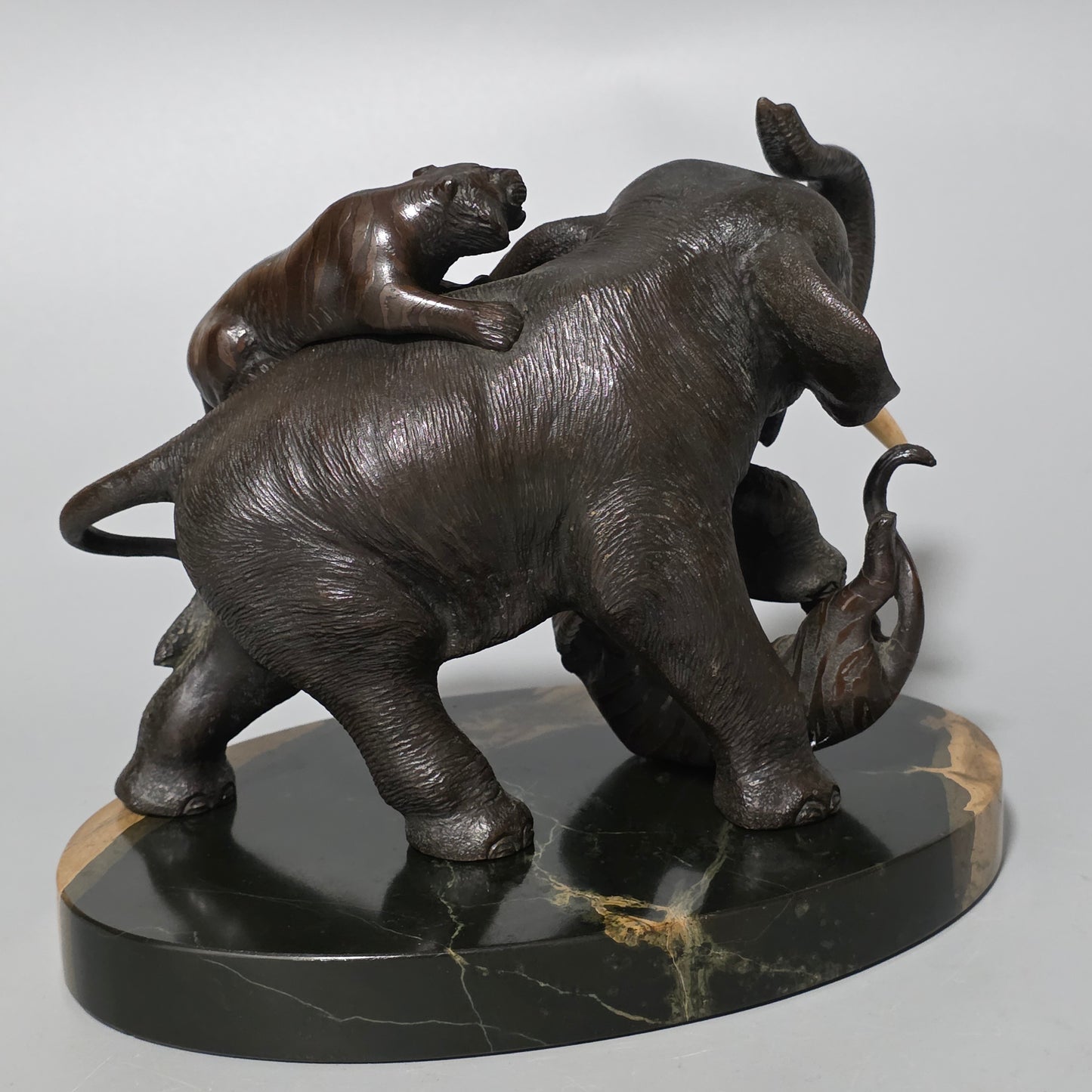 Antique Japanese Bronze Okimono Elephant Fighting Two Tigers, Bone Tusks, Genryusai Seiya Sasku Meiji Showa