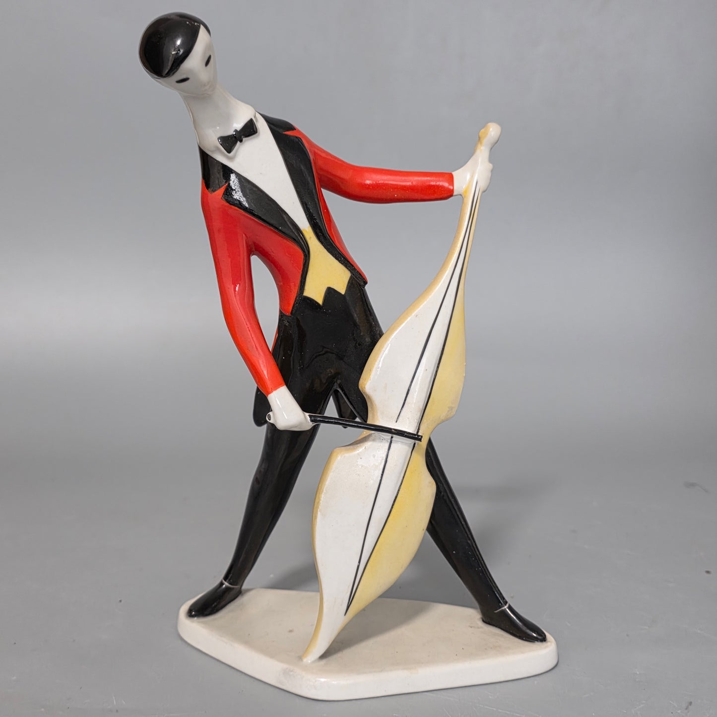 A Fine Zsolnay Pecs Porcelain Figure Of A Cellist