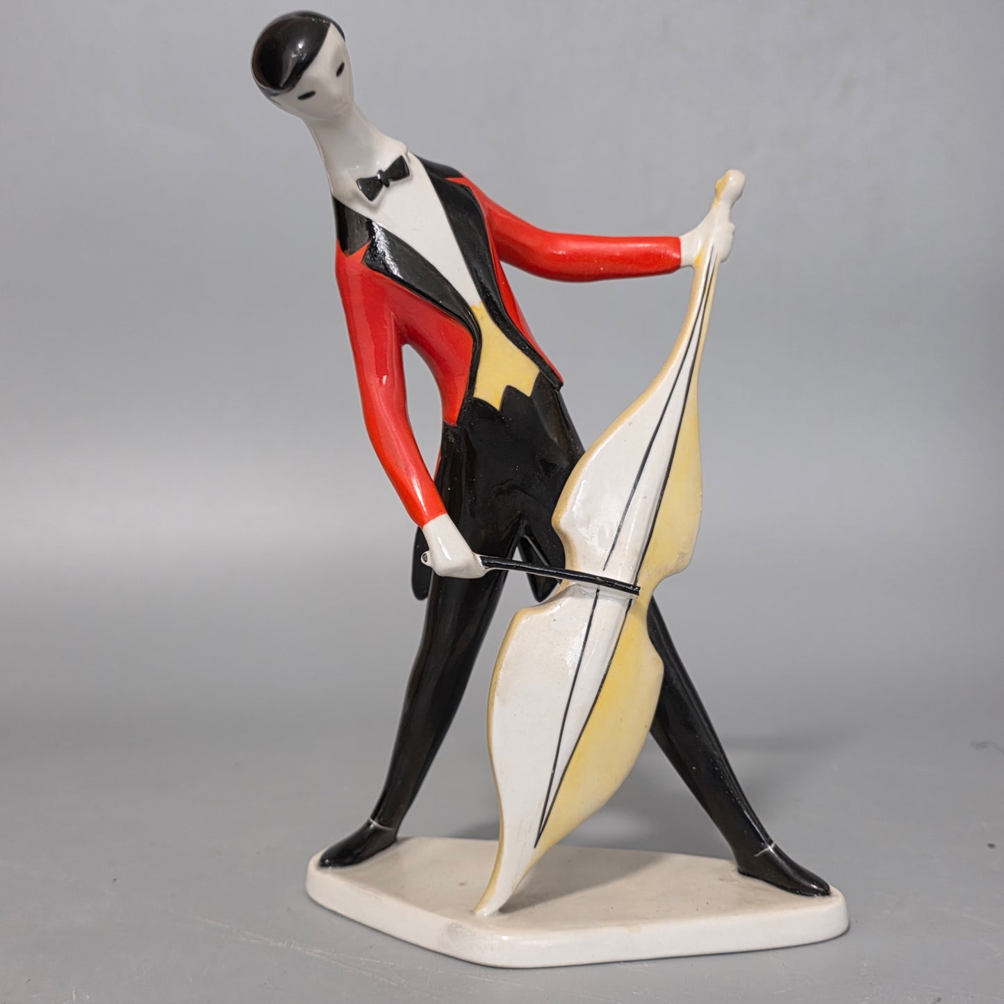 A Fine Zsolnay Pecs Porcelain Figure Of A Cellist