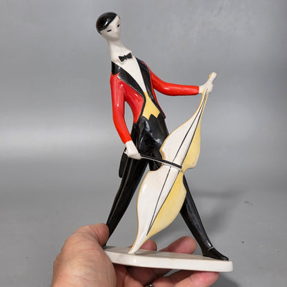 A Fine Zsolnay Pecs Porcelain Figure Of A Cellist