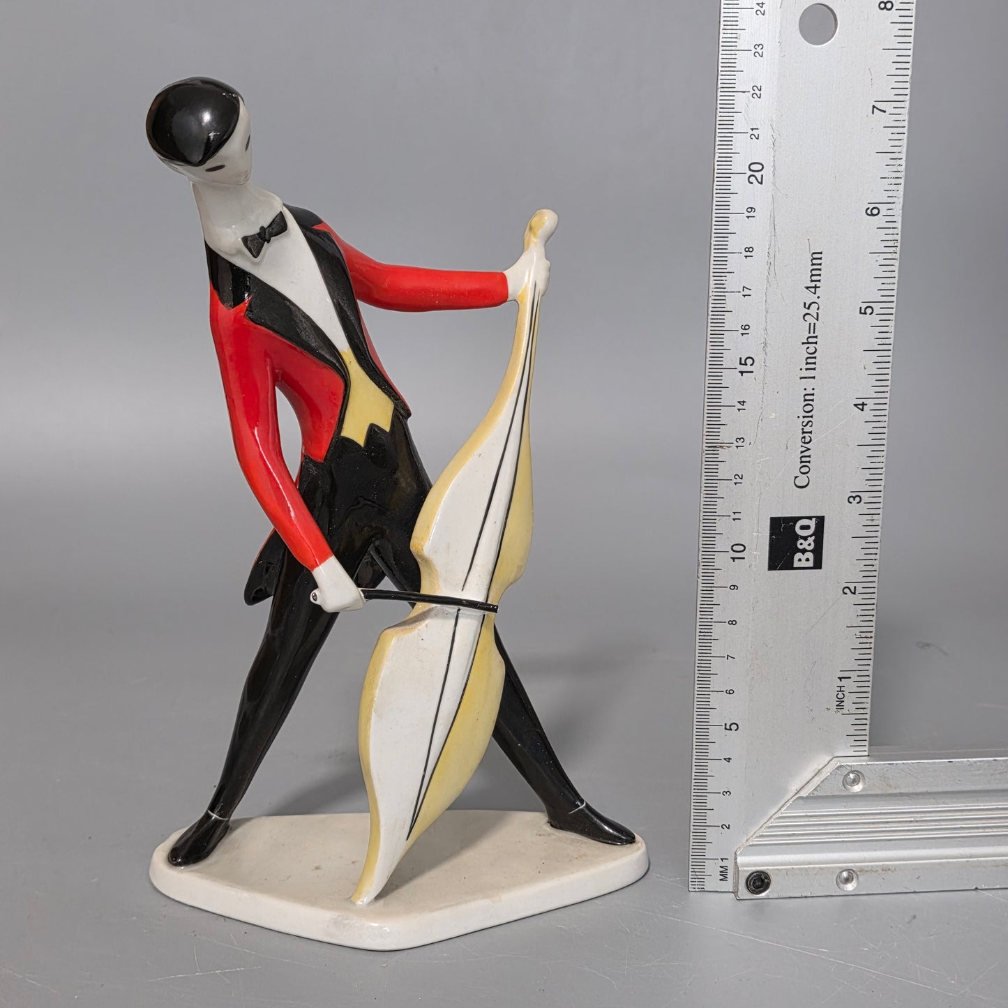 A Fine Zsolnay Pecs Porcelain Figure Of A Cellist