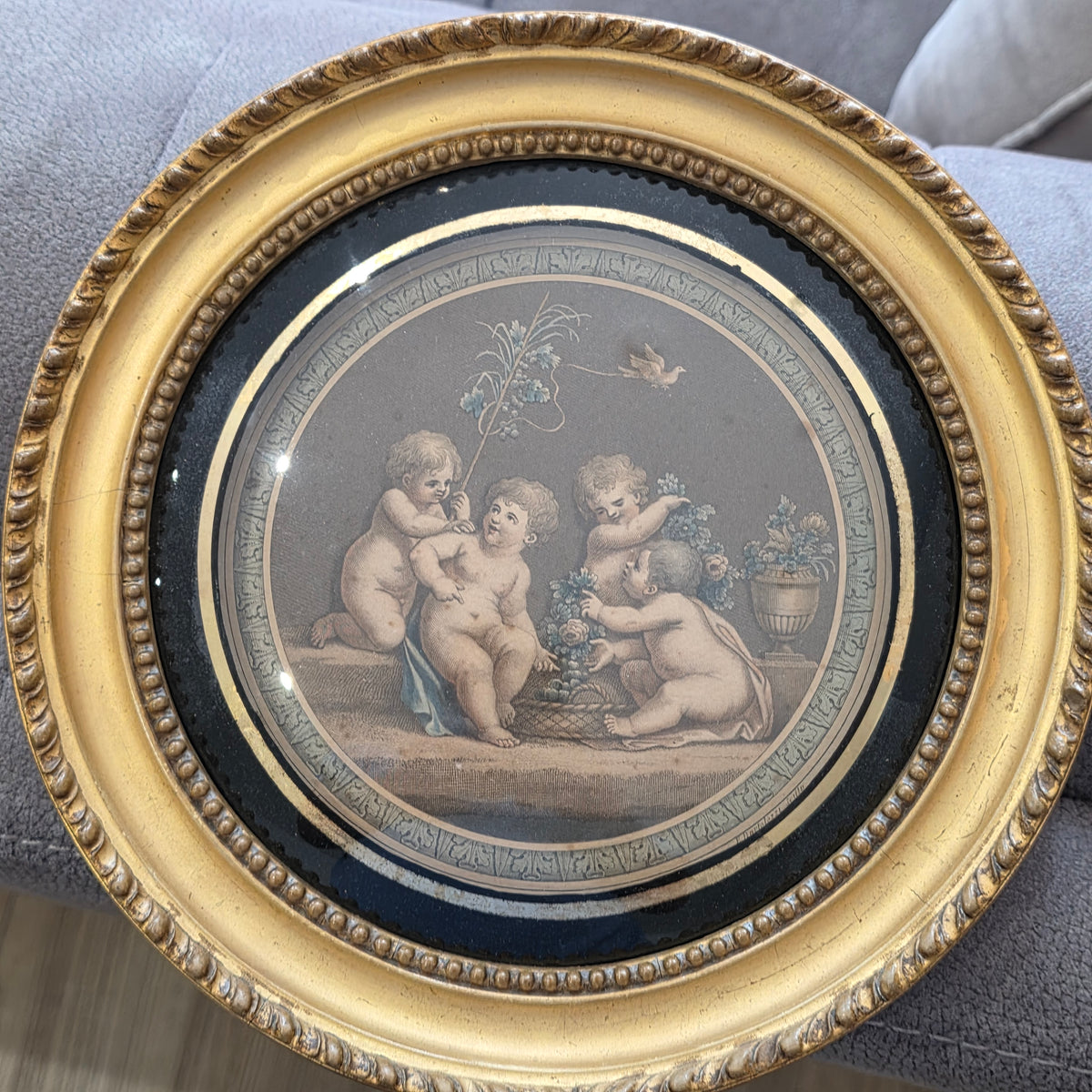 Pair of antique Bartolozzi cherub prints, in gilt wooden frames 25.5cm