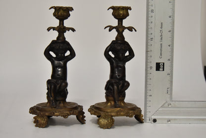 Attractive Pair of Bronze and Brass Cherub Candlesticks, circa 1900