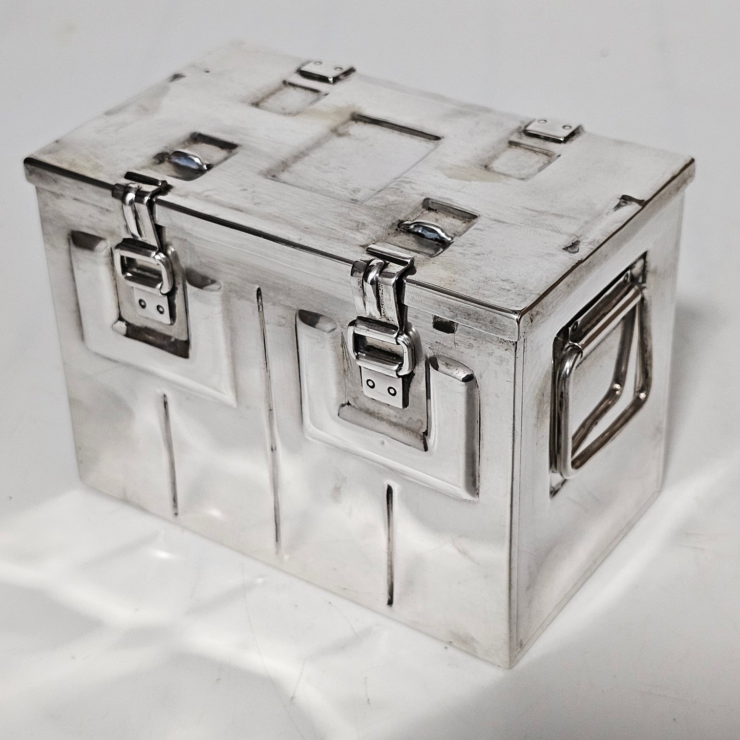 Very Fine and Unusual Silver Casket Modelled as a Coffer for Cigarettes c1941