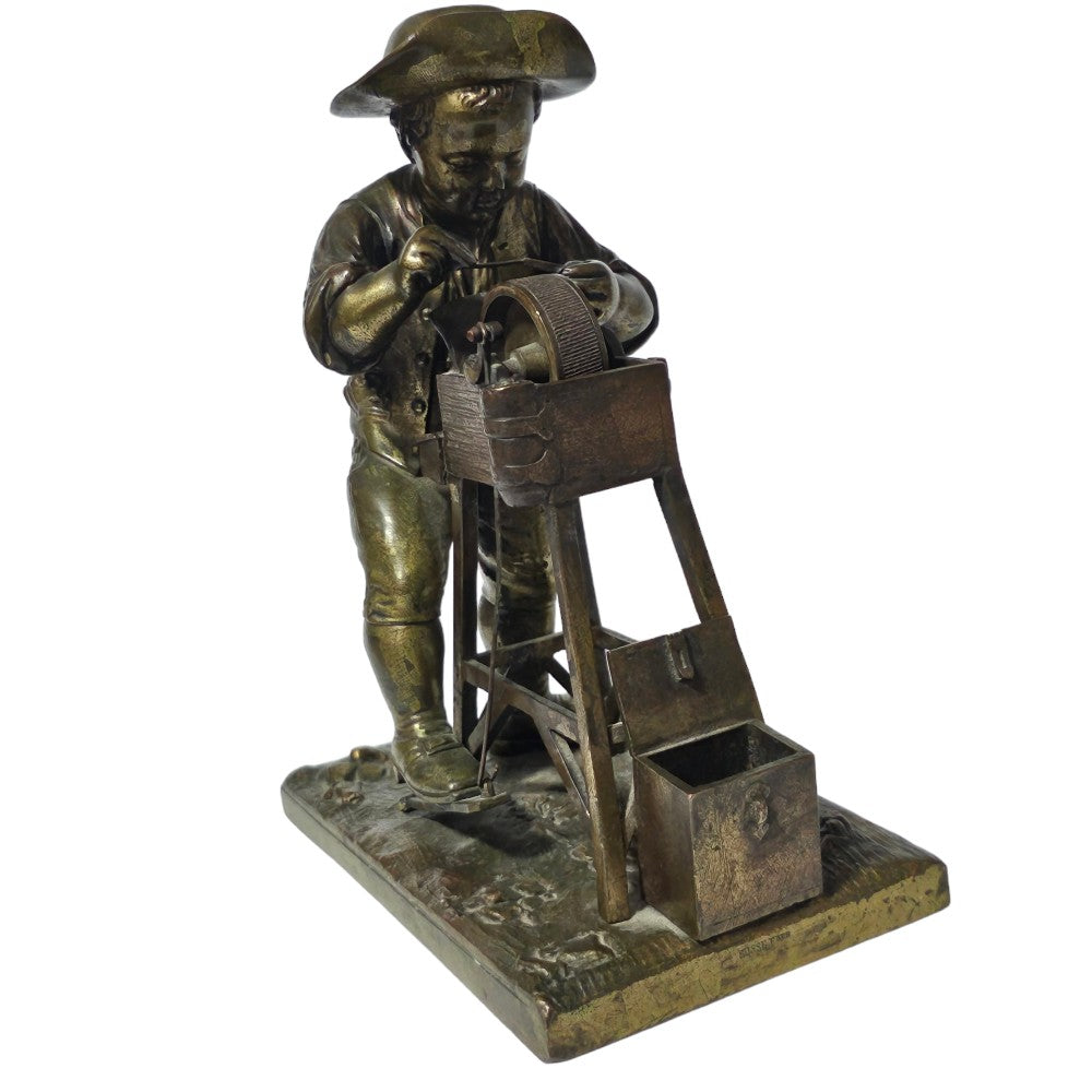 Charles-louis Menne (swedish, 1822–1894) A Gilt Bronze Match Holder & Striker, Cast As A Boy Sharpening A Knife Upon A Grinding Wheel