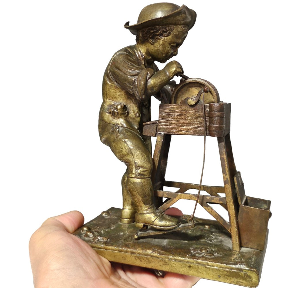 Charles-louis Menne (swedish, 1822–1894) A Gilt Bronze Match Holder & Striker, Cast As A Boy Sharpening A Knife Upon A Grinding Wheel