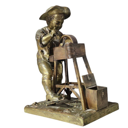 Charles-louis Menne (swedish, 1822–1894) A Gilt Bronze Match Holder & Striker, Cast As A Boy Sharpening A Knife Upon A Grinding Wheel