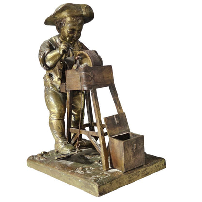 Charles-louis Menne (swedish, 1822–1894) A Gilt Bronze Match Holder & Striker, Cast As A Boy Sharpening A Knife Upon A Grinding Wheel