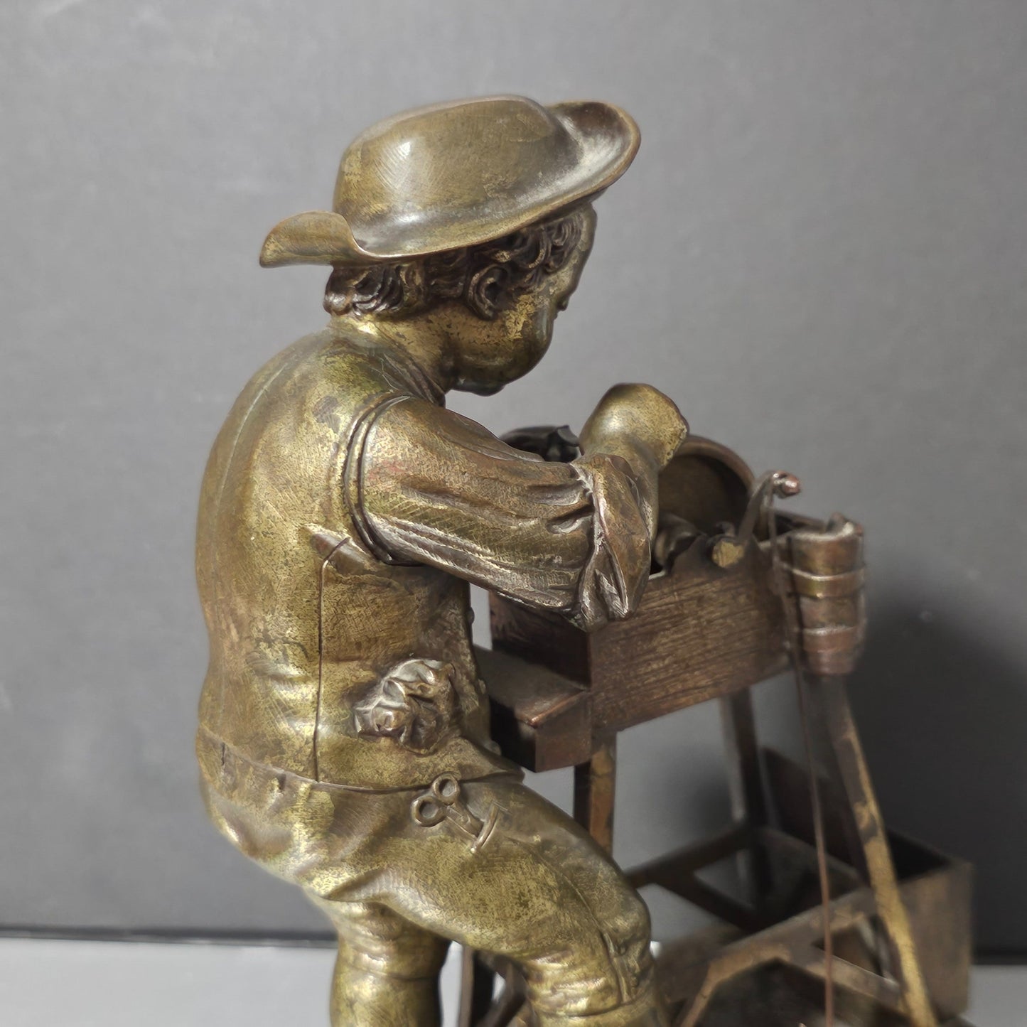 Charles-louis Menne (swedish, 1822–1894) A Gilt Bronze Match Holder & Striker, Cast As A Boy Sharpening A Knife Upon A Grinding Wheel