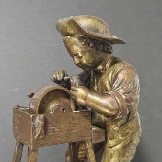 Charles-louis Menne (swedish, 1822–1894) A Gilt Bronze Match Holder & Striker, Cast As A Boy Sharpening A Knife Upon A Grinding Wheel